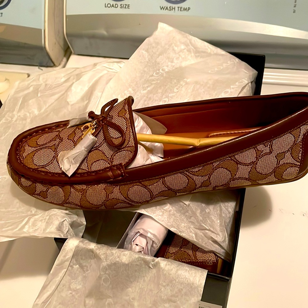 Brand new coach loafers. Never worn.
